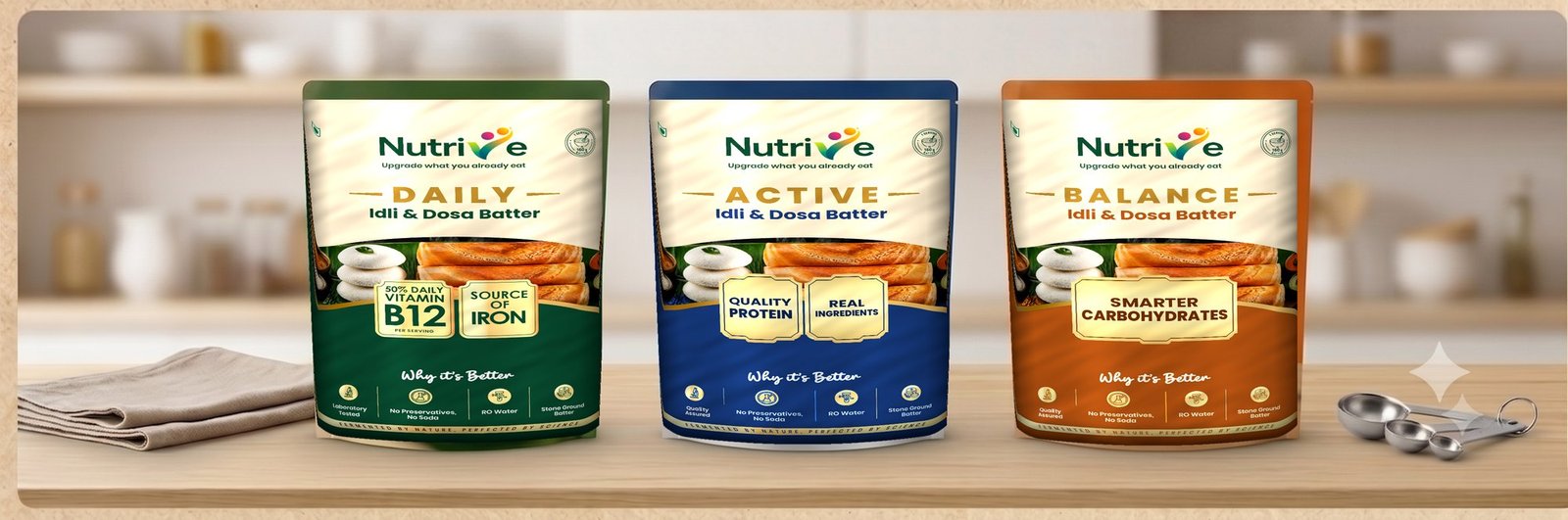 The Nutrive range on a kitchen counter — Daily, Active and Balance idli and dosa batter pouches